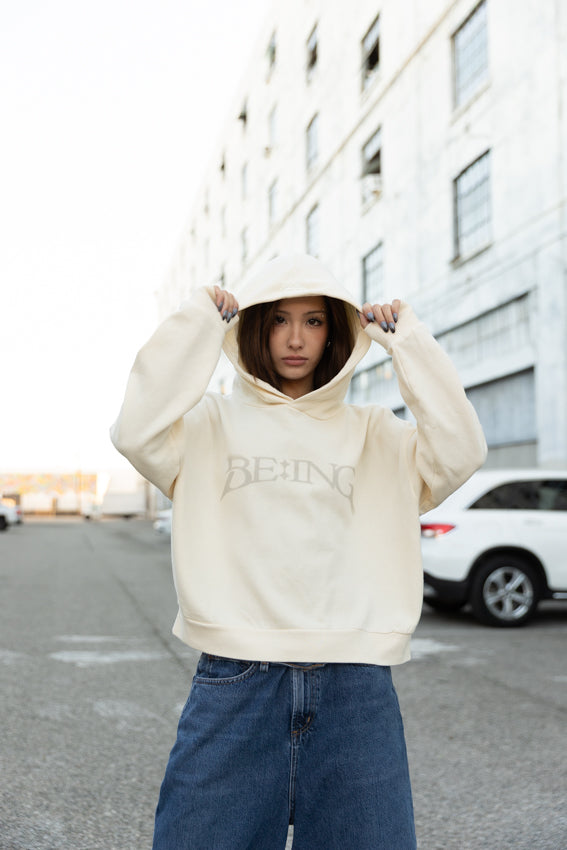 T1 BE:ING Cropped Hoodie - Cream