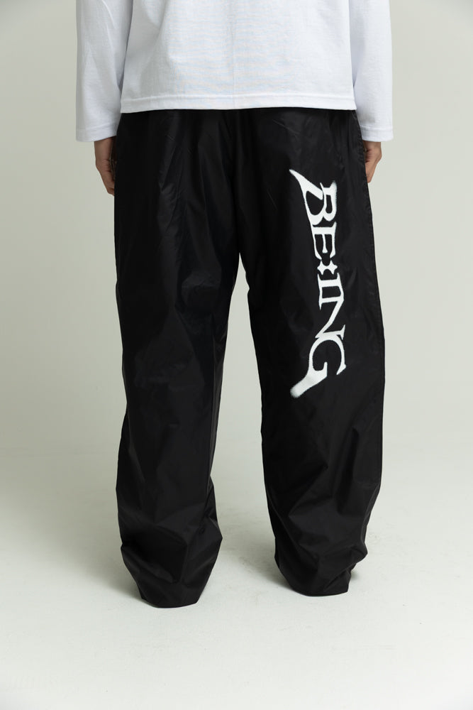 T1 BE:ING Windbreaker Pants- Black