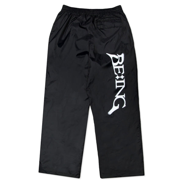 T1 BE:ING Windbreaker Pants- Black